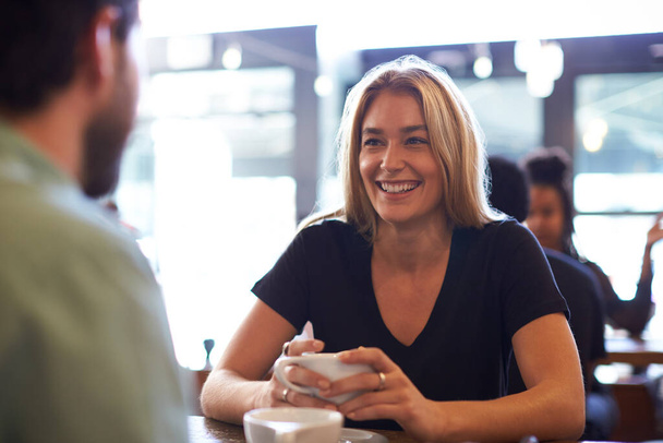 Couple Meeting And Chatting In Coffee Shop Sitting At Table - Photo, image