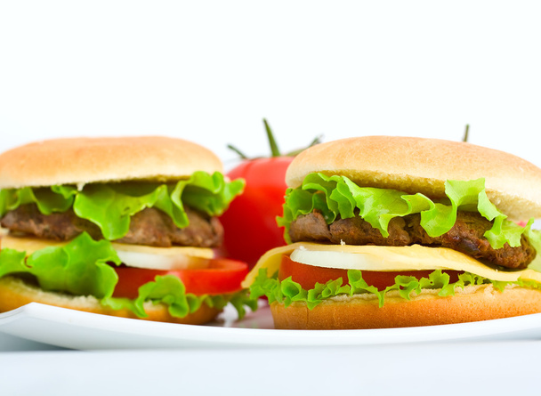 két sajtburgert és a paradicsom - Fotó, kép