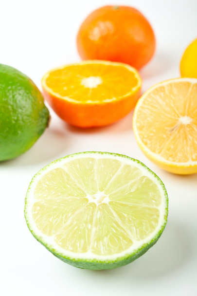 Halves limes, tangerines and lemons - Foto, imagen