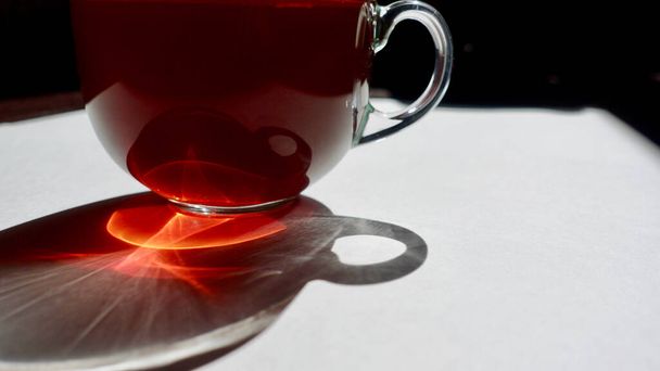  Cup of tea closeup . Light and shadow . Copy space                               - Fotó, kép