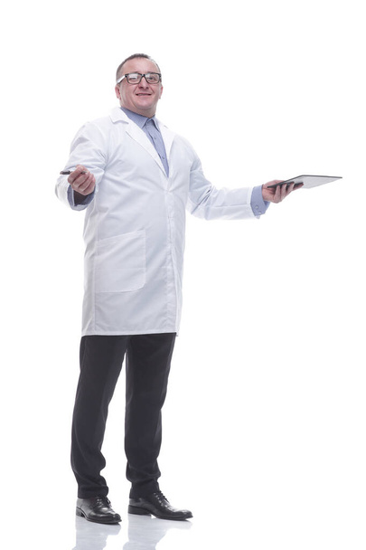 in full growth. friendly competent doctor with clipboard - Фото, зображення
