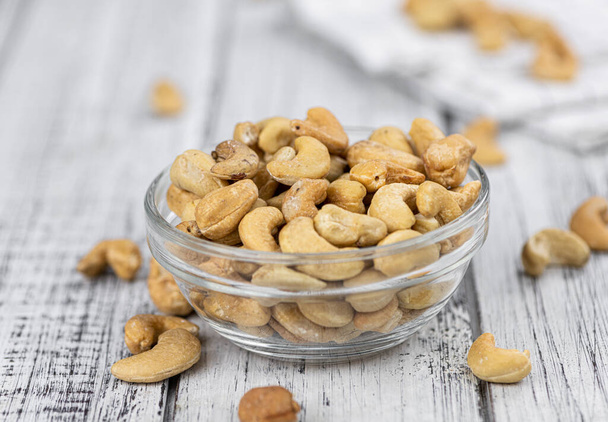 Portion of roasted Cashew Nuts (close up shot; selective focus) - Foto, imagen