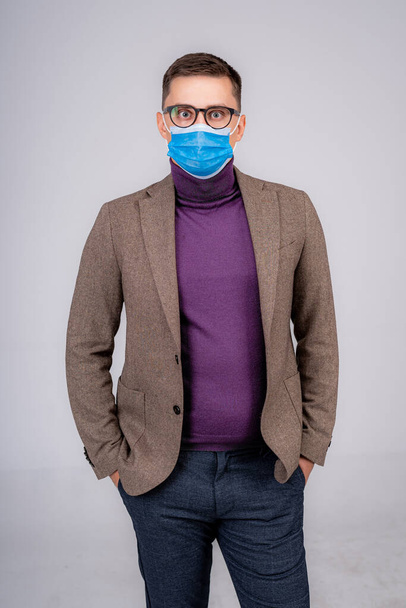 Businessman or office worker wearing mask for protection against Covid-19 or corona virus disease. Healthcare concept. - Fotoğraf, Görsel