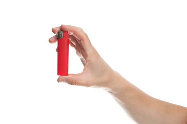 red lighter in male hand isolated on white backgroun - Photo, image