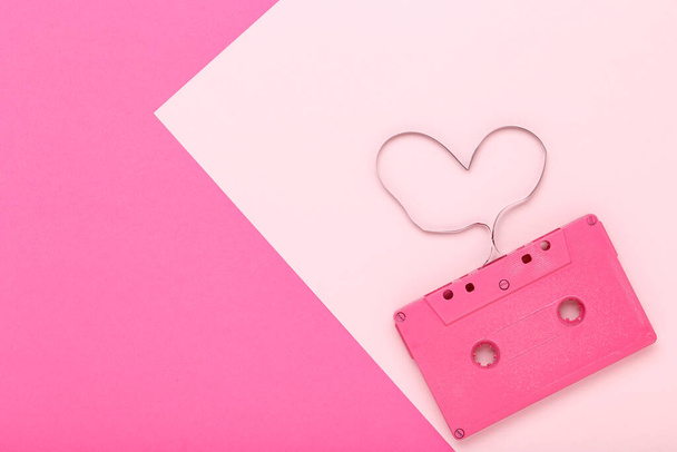 Cassette tape on pink background - 写真・画像