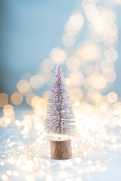 Christmas spruce with tree and blurred shiny lights. - Fotografie, Obrázek