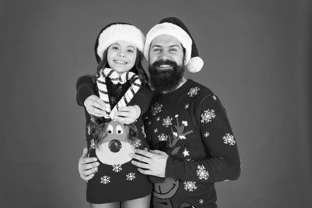Christmas is love. Little daughter show love heart to father. Bearded man and small child on xmas. Share love and care. Family values. Happy family celebrate new year and Christmas. Love and trust - Foto, Bild