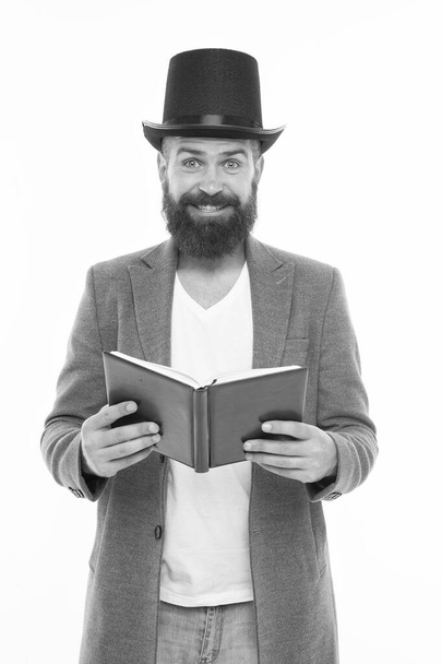 Funny stories. Comedian guy. Hilarious comedy for someone else might be drama. Sense of humor. Smiling hipster with book. Reading jokes. Comedy concept. Comedy actor. Man in top hat and jacket - Zdjęcie, obraz