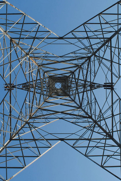 High voltage post or High voltage tower with blue sky backgrpund in the morning - Photo, Image