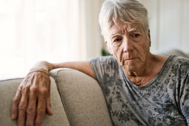 Portrait Of Senior Woman On Sofa Suffering From Depression - Photo, Image