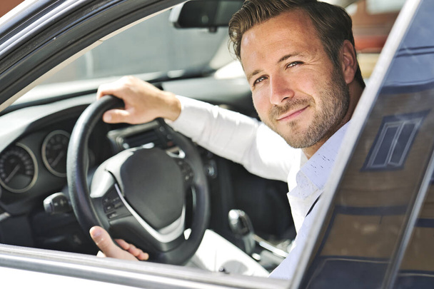 A Portrait of man on his car look nice - Foto, Bild
