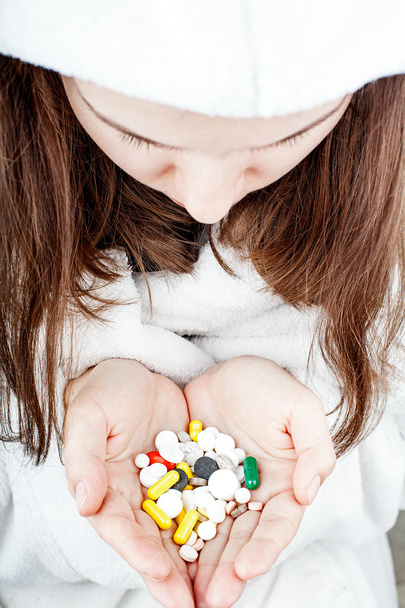 girl suicide and a handful of pills - Photo, Image