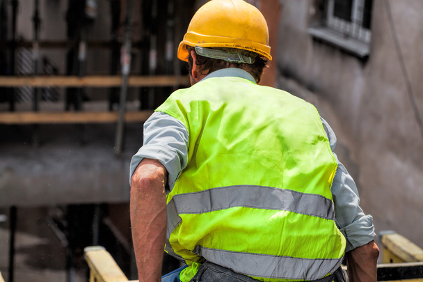Worker on the building site - Foto, imagen