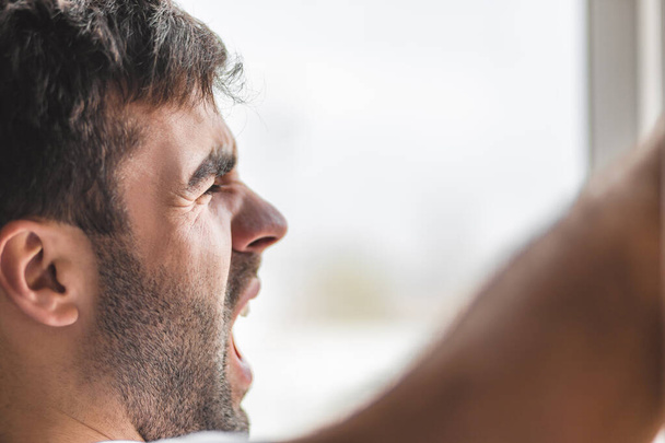 Cropped photo of bearded man waking up in the morning. - Fotoğraf, Görsel