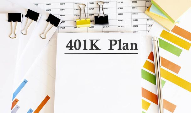 Paper with 401k plan on a table with chart - Photo, Image