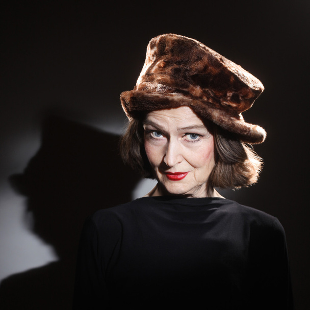 Senior woman in winter hat fashion - Фото, зображення