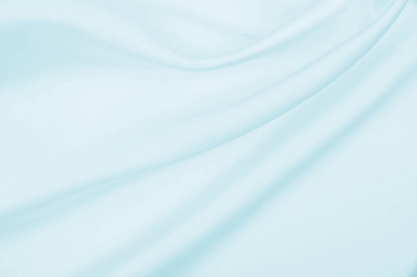 Smooth elegant blue silk or satin luxury cloth texture can use as abstract background. Luxurious background design - Fotografie, Obrázek