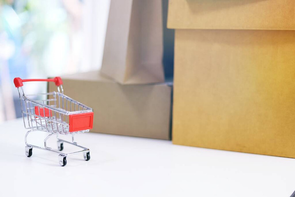 Shopping cart for Internet online shopping e-commerce online delivery service concept   - Valokuva, kuva