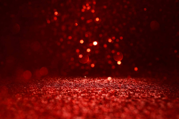 background of abstract red, gold and black glitter lights. defocused - Foto, Bild