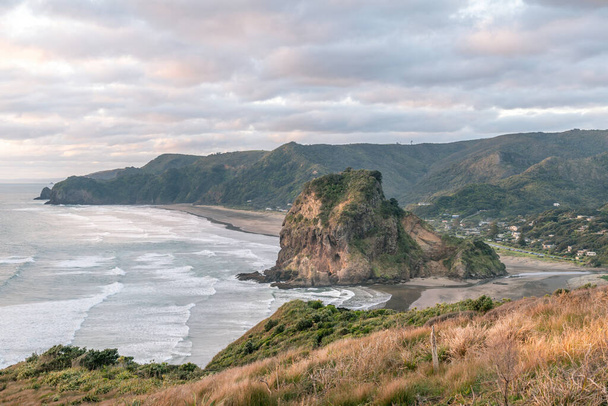 View of Piha Lion Rock in winter evening light - Photo, image
