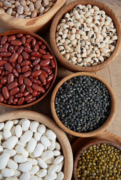 assortment of beans on wooden surface - Φωτογραφία, εικόνα