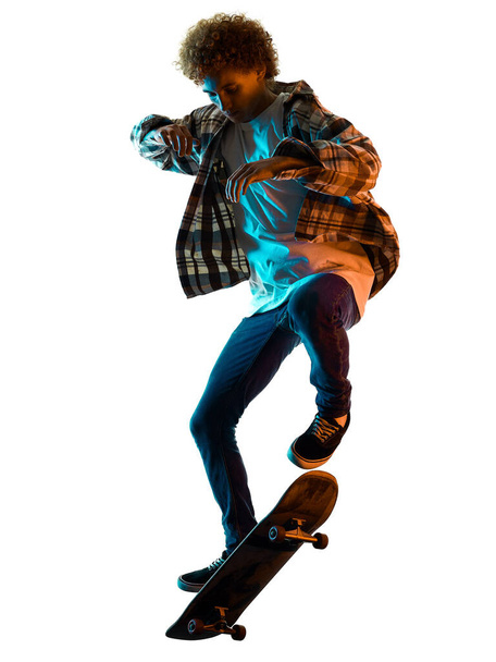 young man skateboarder Skateboarding isolated white background shadow silhouette - Foto, afbeelding