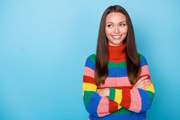 Portrait of positive cheerful girl worker cross hands look copyspace enjoy decide choose work decision choice wear rainbow style pullover isolated over blue color background - Fotó, kép