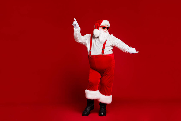 Full length body size view of his he attractive cool funny playful fat white-haired Santa having fun dancing rock day isolated bright vivid shine vibrant red burgundy maroon color background - Zdjęcie, obraz