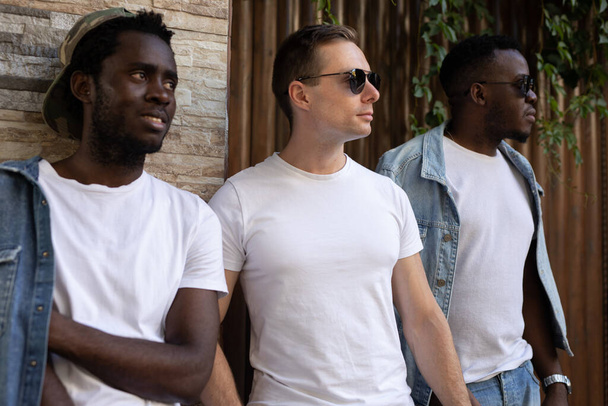 Multiracial happy friends in white t-shirts - Φωτογραφία, εικόνα