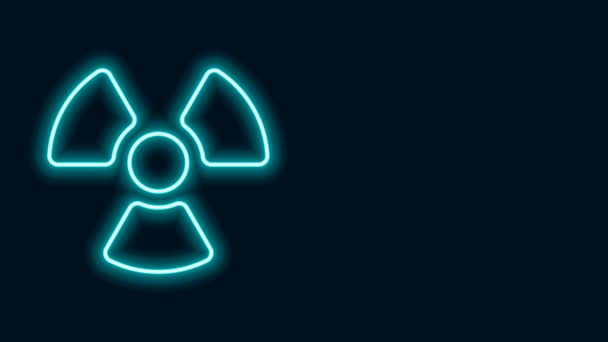 Glowing neon line Radioactive icon isolated on black background. Radioactive toxic symbol. Radiation Hazard sign. 4K Video motion graphic animation - Footage, Video