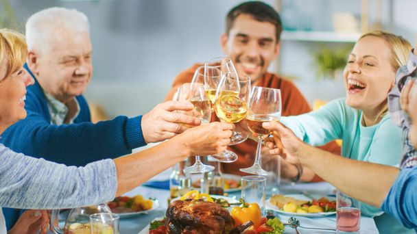 Big Family and Friends Celebration at Home, Diverse Group of Children, Young Adults and Old People Gathered at the Table have Fun Conversation. Clinking Glasses and Making Toast. - Φωτογραφία, εικόνα