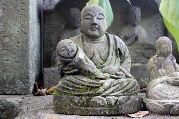 Statue of Buddha and Jizo at a Japanese temple. - Zdjęcie, obraz