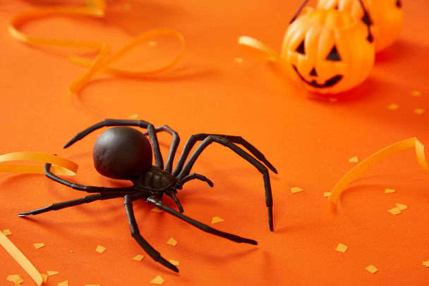Funny Halloween day decoration party cute pumpkin ghost and  spider isolated on orange background - Photo, Image