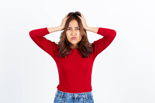 asian young woman having headache on white background - 写真・画像