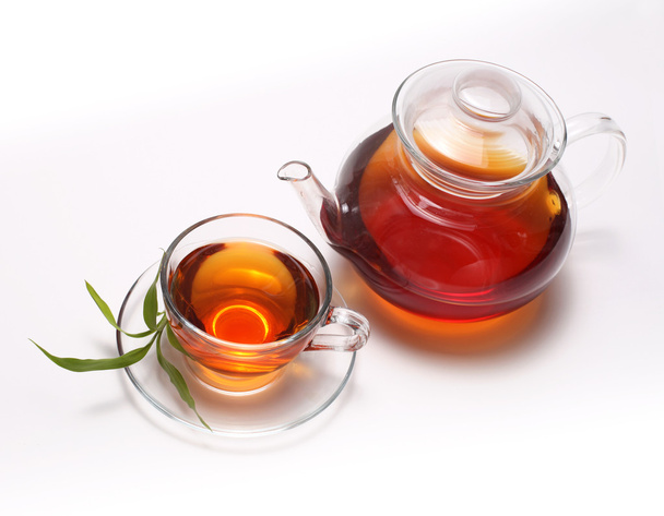 Cup of tea and teapot - Фото, зображення