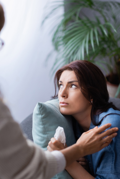 brunette woman with mental problem visiting therapist - Foto, Bild