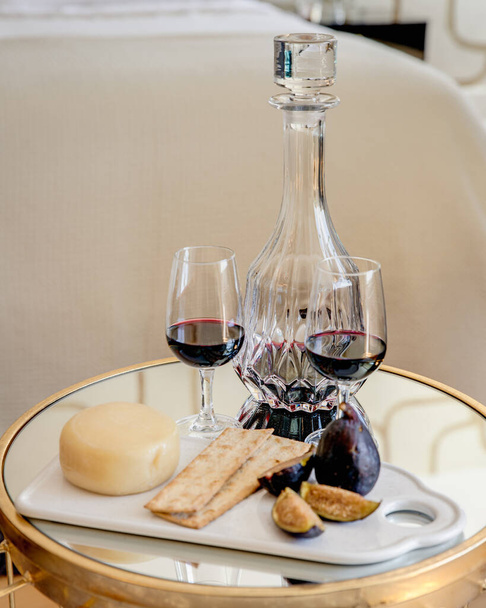 Stylish tray with wine cheese and crackers - Photo, Image