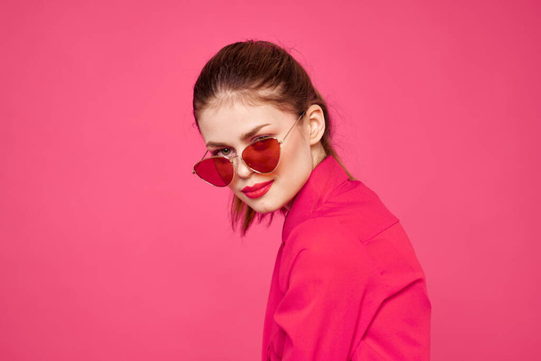 Woman in pink shirt and brown glasses cropped view fashion model emotions gesturing hands portrait - Fotoğraf, Görsel