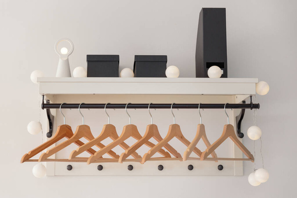 Stylish Clothes Hanger Decorated With Christmas Lights - Fotó, kép