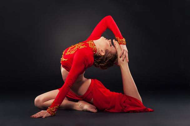 Sporty woman doing yoga exercise - Fotoğraf, Görsel