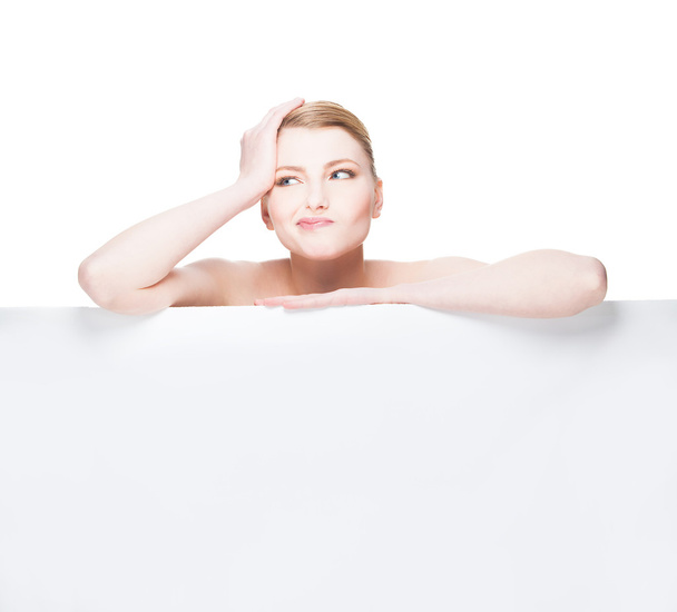 Beautiful expresive and natural woman lying on white panel - Fotoğraf, Görsel