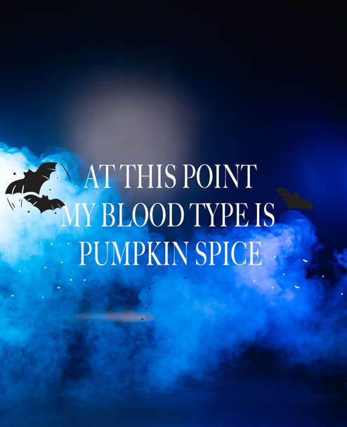 at this point my blood type is pumpkin spice lettering dark blue background with smoke  - Zdjęcie, obraz