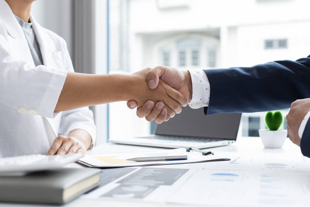 Greeting and meeting, business partners as partners shaking hands to congratulate each other to work together, Building friendship in real estate investment , handshake concept. - Photo, Image