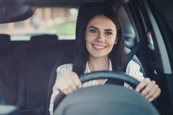 Close-up portrait of her she nice-looking attractive lovely brunette cheerful content girl executive secretary assistant worker riding car early morning going office company visit - Foto, Bild