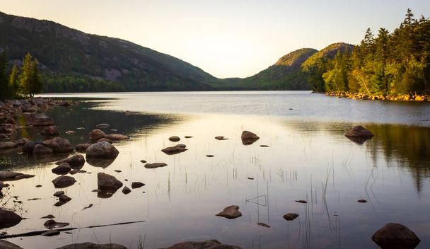 One of many beautiful views to be seen when hiking the trail around Jordan Pond at Acadia National Park in Maine. - Photo, Image