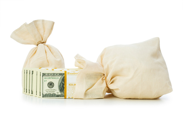 zakken met geld op de witte geïsoleerd - Foto, afbeelding