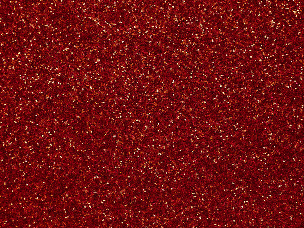 A glittery red paper. Golden glitter light bokeh abstract texture. Pattern designs. Sparkle wallpaper for Christmas. Brilliance shimmering sequin background. Party time. - Photo, Image