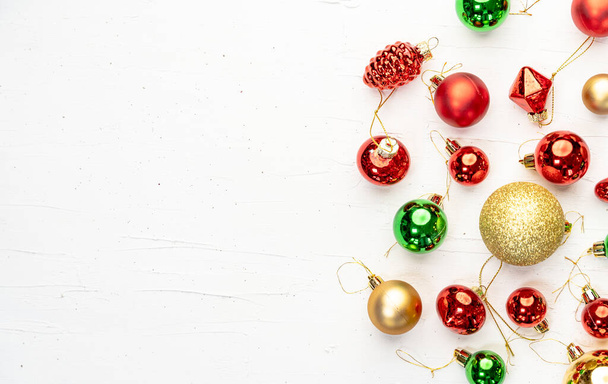 An overhead shot of colorful Christmas ornaments with space for your text - Φωτογραφία, εικόνα