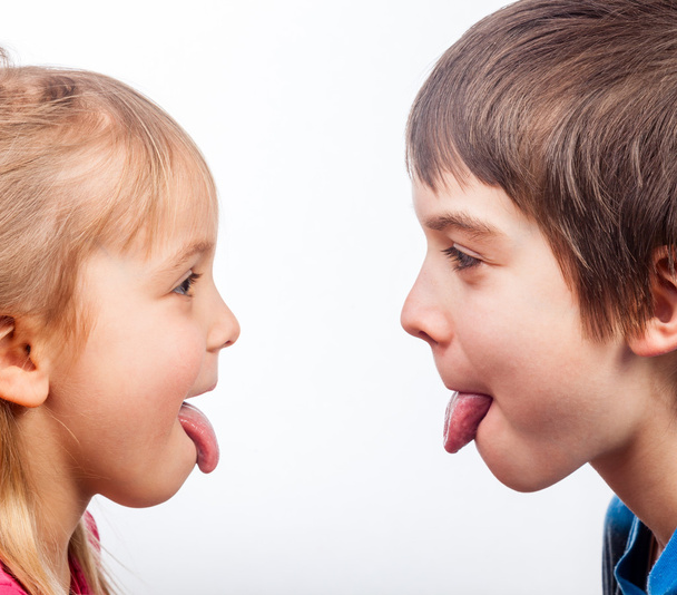 Kids sticking out tongues - Photo, Image