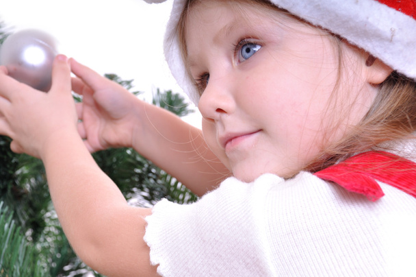 Little girl near Christmas tree - Photo, Image